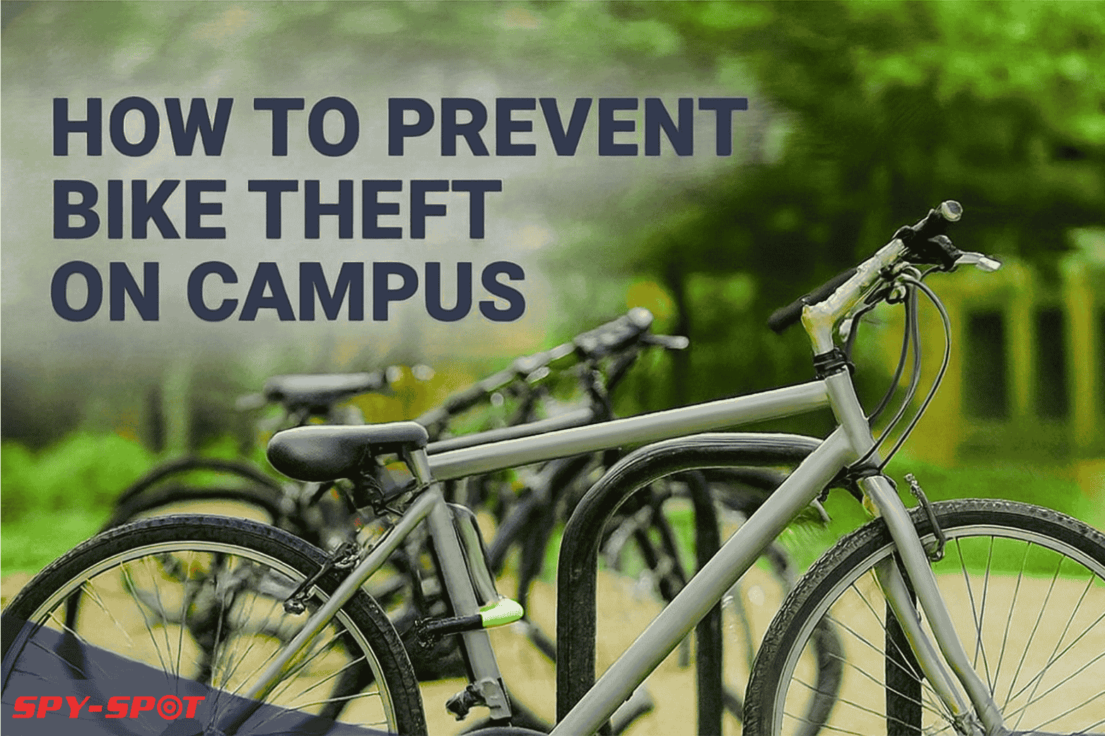 Student locking bicycle to campus rack with U-lock to prevent bike theft